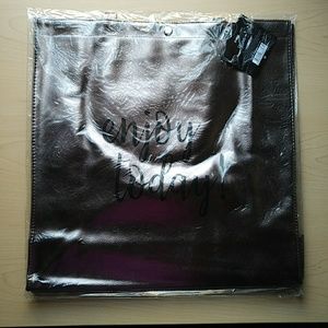 Free tote with purchase. See below for details.